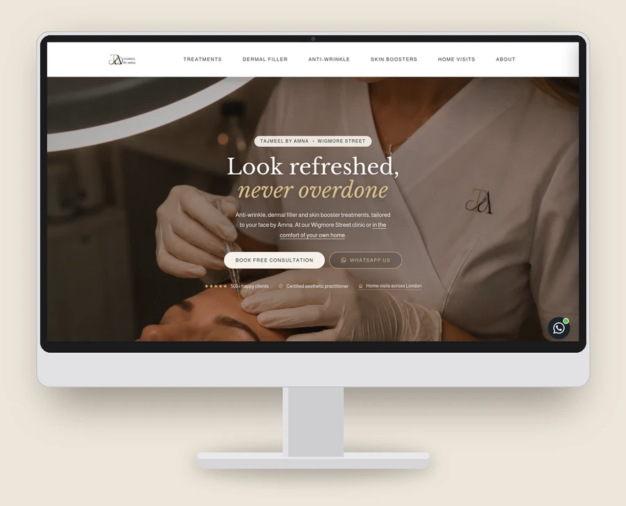 The Tajmeel by Amna website we built, shown on a desktop monitor: a practitioner at work behind the headline Look refreshed, never overdone
